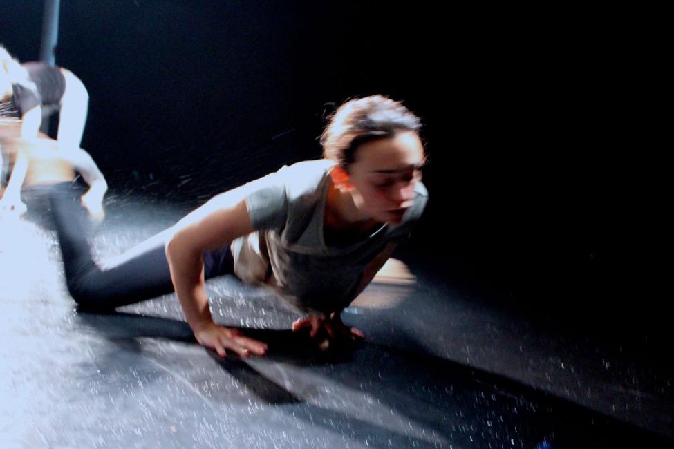 A woman sliding on a wet floor